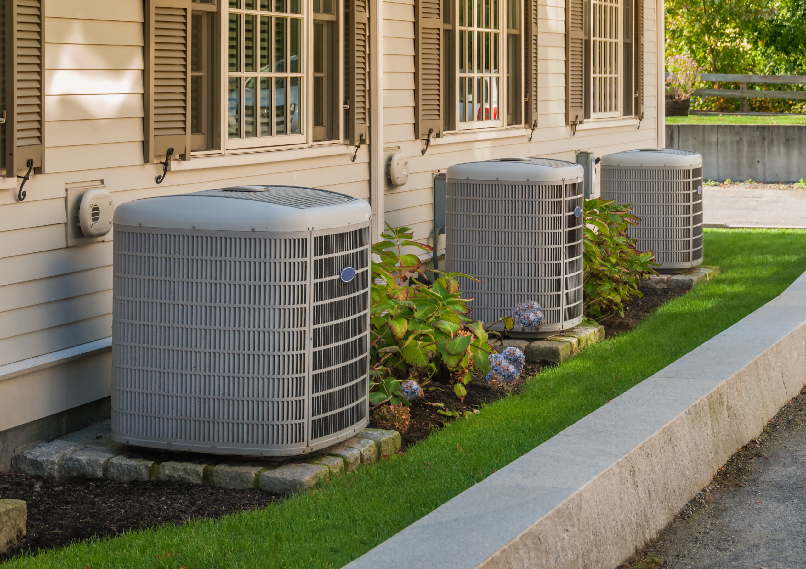 Heating,And,Air,Conditioning,Inverters,On,The,Side,Of,A